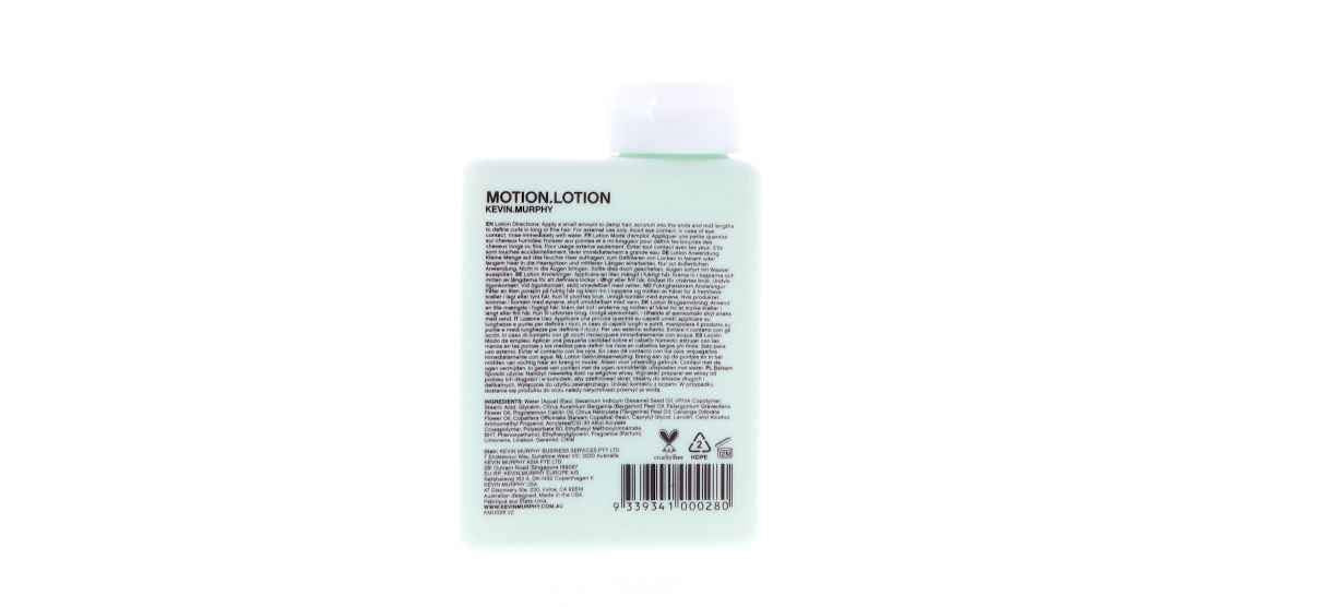Kevin Murphy Motion.Lotion model hair showing smoother, manageable curls with subtle lift.