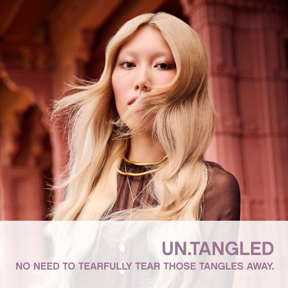 KEVIN.MURPHY UN.TANGLED spray mist application on damp hair for knot-free styling
