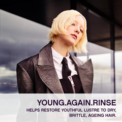 KEVIN.MURPHY Young.Again.RINSE bottle side emphasizes lightweight conditioning for brittle, dry strands.