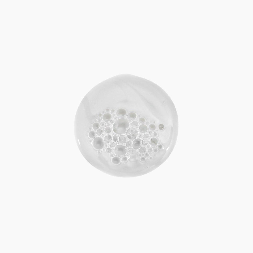 Kevin Murphy Young Again Wash creamy lather shown during hair wash