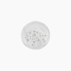 Kevin Murphy Young Again Wash creamy lather shown during hair wash