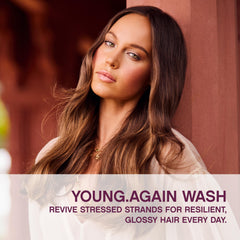 KEVIN.MURPHY YOUNG.AGAIN.WASH creamy lather on hair showing hydration and shine.