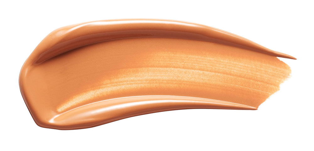 Swatch of Kevyn Aucoin Etherealist concealer demonstrates peach undertone correcting shadows