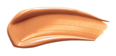Swatch of Kevyn Aucoin Etherealist concealer demonstrates peach undertone correcting shadows