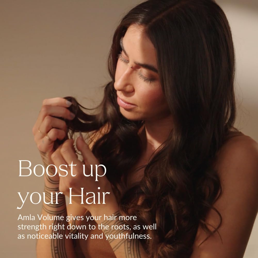 KHADI Amla Volume lather in hand showing rich, gentle foam.