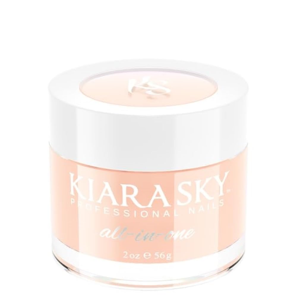 Kiara Sky Autumn Blonde cover powder bottle highlights a smooth nude warmth for nails.