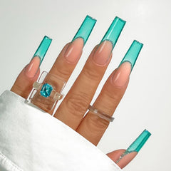 KIARA SKY jelly tint You Succulent swatch shows translucent teal depth.