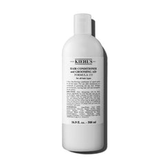 Kiehl's Formula 133 bottle close-up highlighting moisturizing leave-in conditioner for all hair types.
