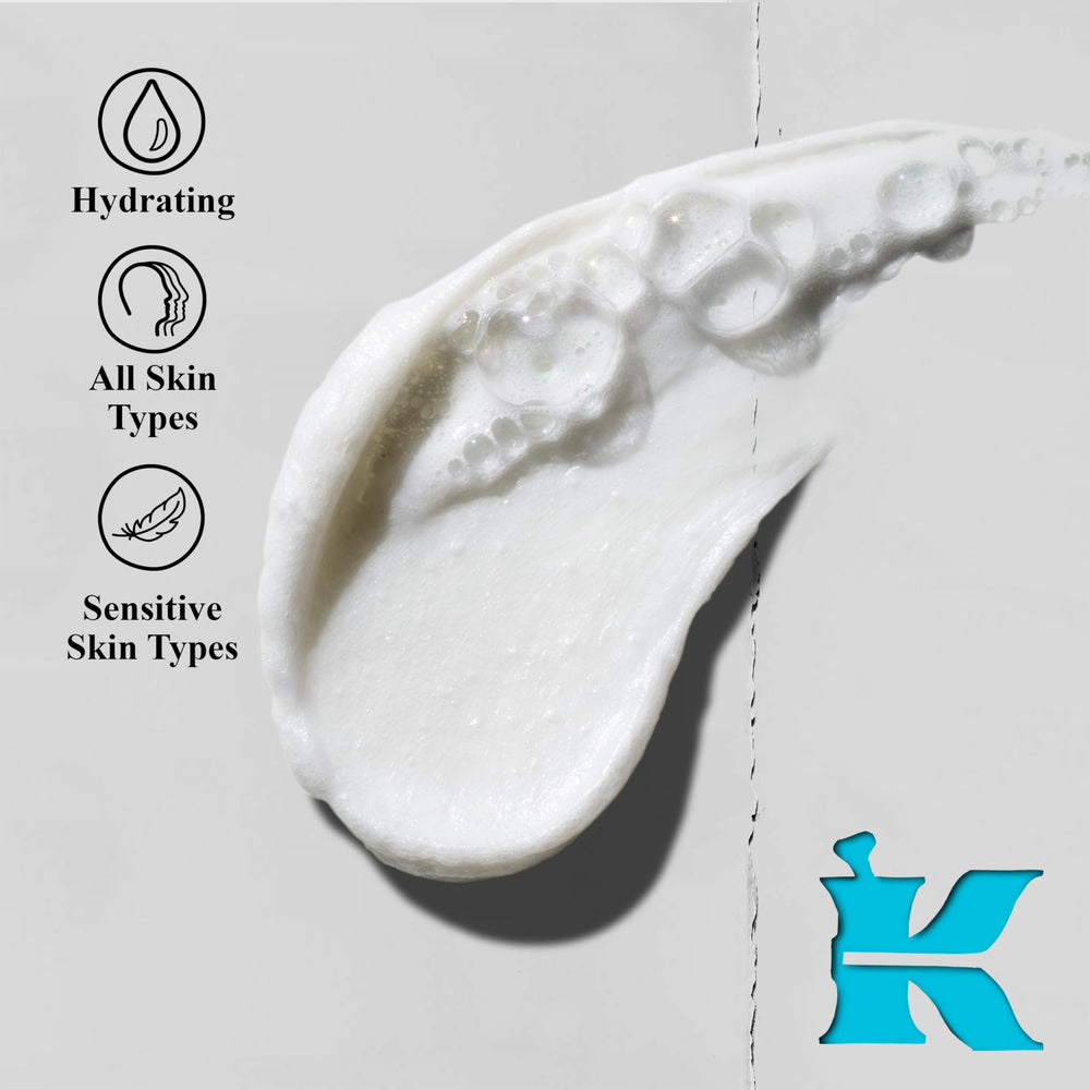 Kiehl's Ultra Facial cleanser texture close-up shows cream-to-foam transition.
