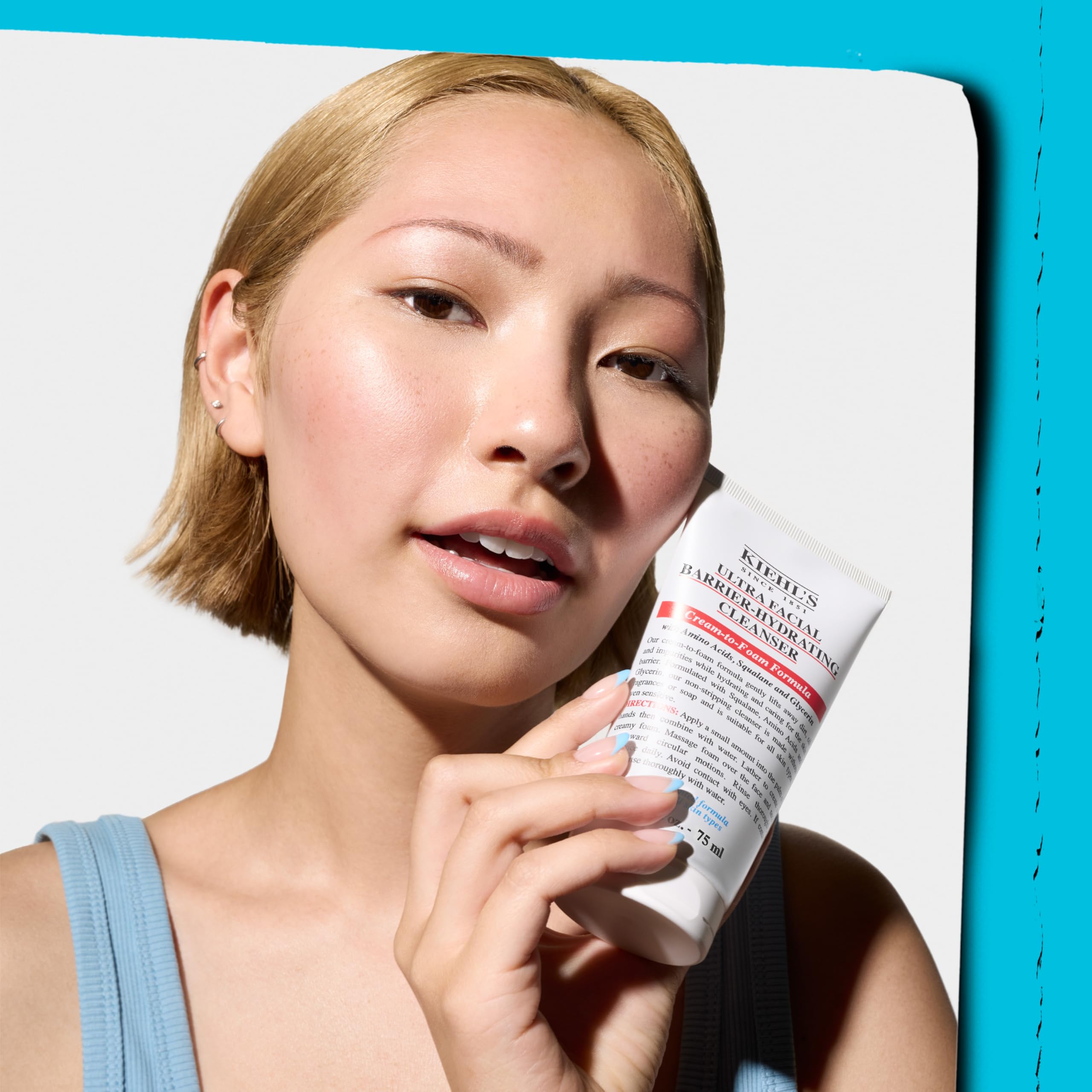 Kiehl's Ultra Facial cleanser used at the sink during skincare routine.