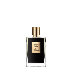 Kilian Sacred Wood EDP packaging and refill sleeve emphasizing versatility and a warm unisex aura.