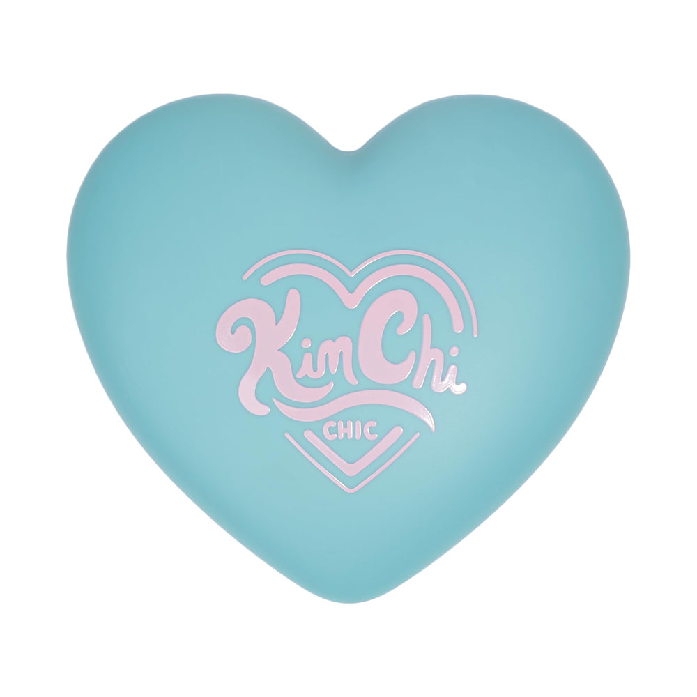 Kimchi Chic Spinning Hearts Love Eyeshadow palette highlights lids with shimmer shades for dimension.