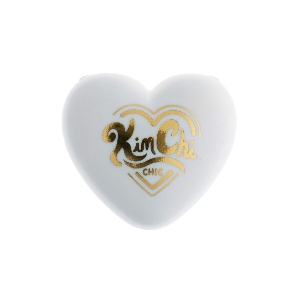 KimChiChic body shimmer across shoulders for radiant iridescence