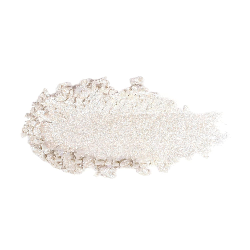KimChiChic Pearl Gone Wild powder being dusted with brush