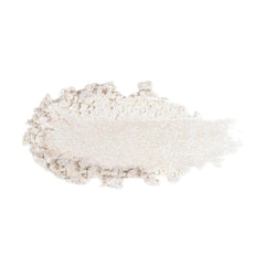KimChiChic Pearl Gone Wild powder being dusted with brush