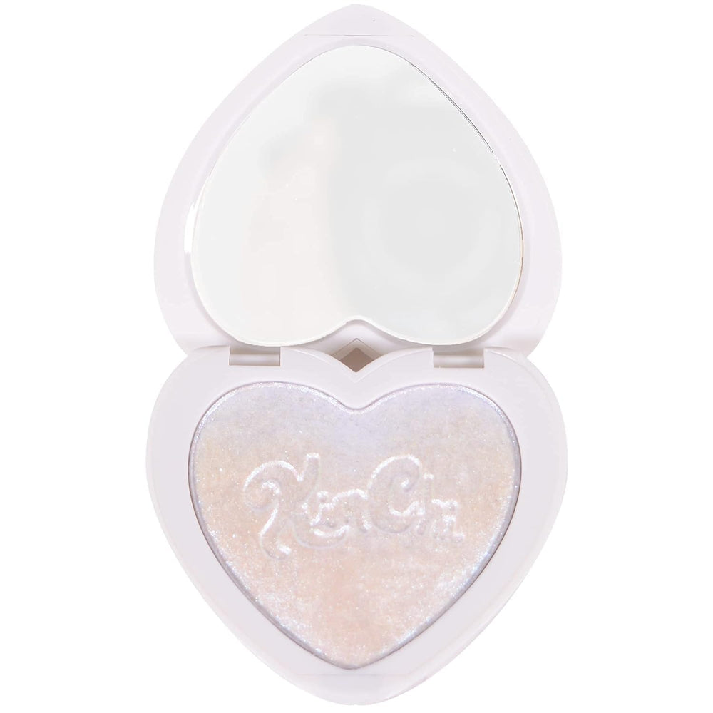 KimChiChic Pearl Gone Wild heart compact showing portable glow on the go