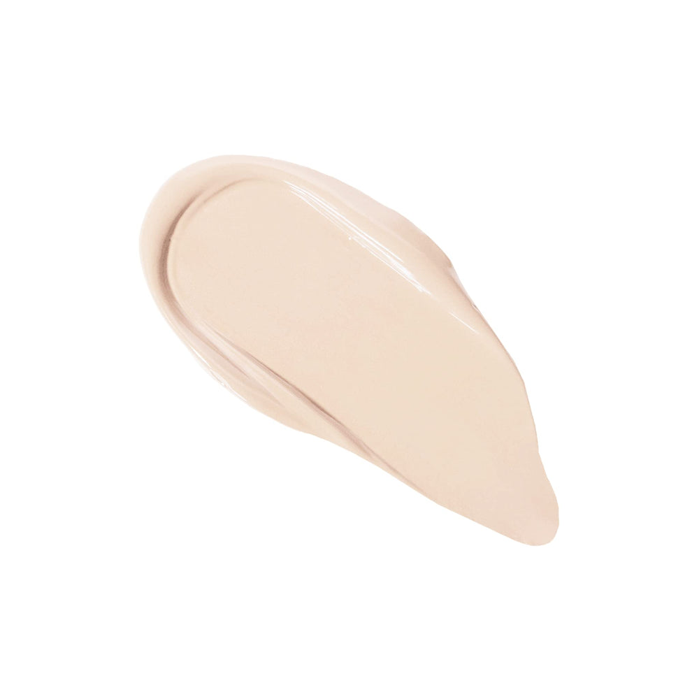 KimChiChic concealer blemish-cover swatch demonstrating buildable coverage.