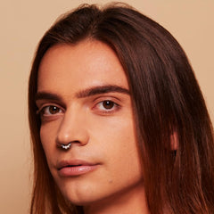 KimChiChic Beauty foundation brush application demonstrates easy blending.