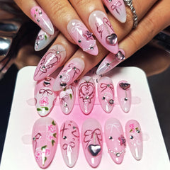 KimKista almond pink ombre nails with 3D hearts for a romantic look