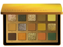 Kits Natasha Denona Yucca Palette foiled shades for vibrant daytime looks and statement sparkle.