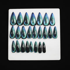 KKUUOO Cat eye blue nails showcasing shimmering color shift.