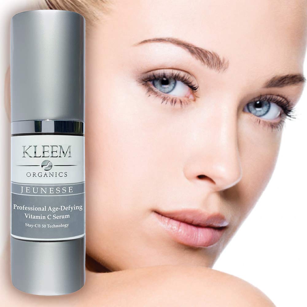 Kleem Organics Vitamin C Serum dropper applying serum for even tone