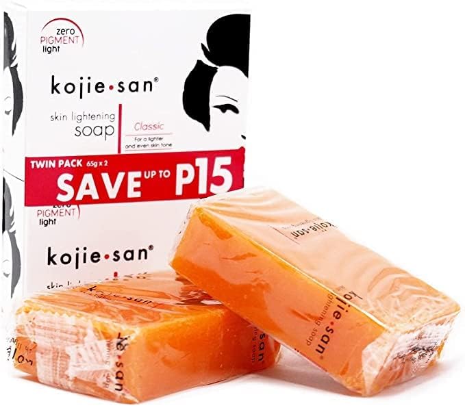 Kojie San kojic acid bar slice closeup highlighting exfoliating texture.