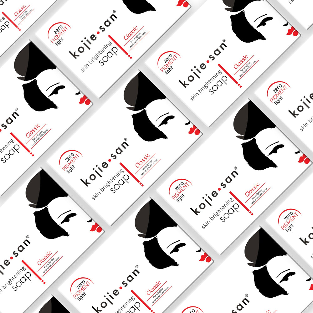 Kojie San soap bar close-up highlights Kojic Acid texture for skin clarity.