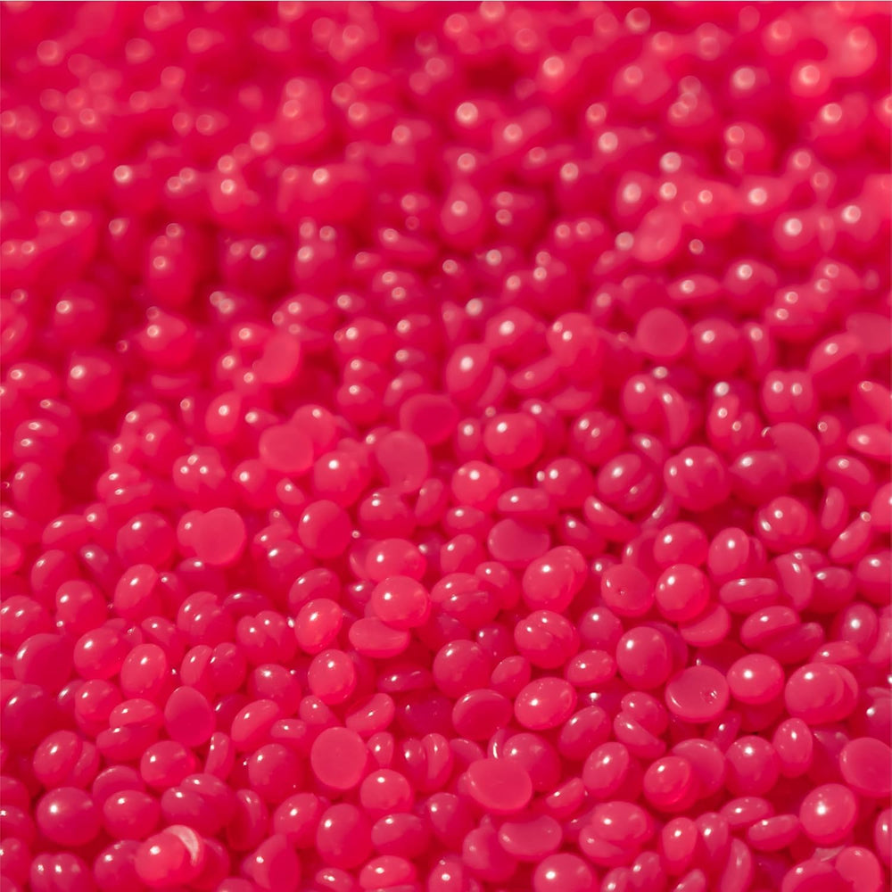 KoluaWax hard wax beads ready for facial waxing with a warm pot.
