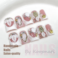 Koopnati handmade nails in short duck pink with 3D art on a natural base