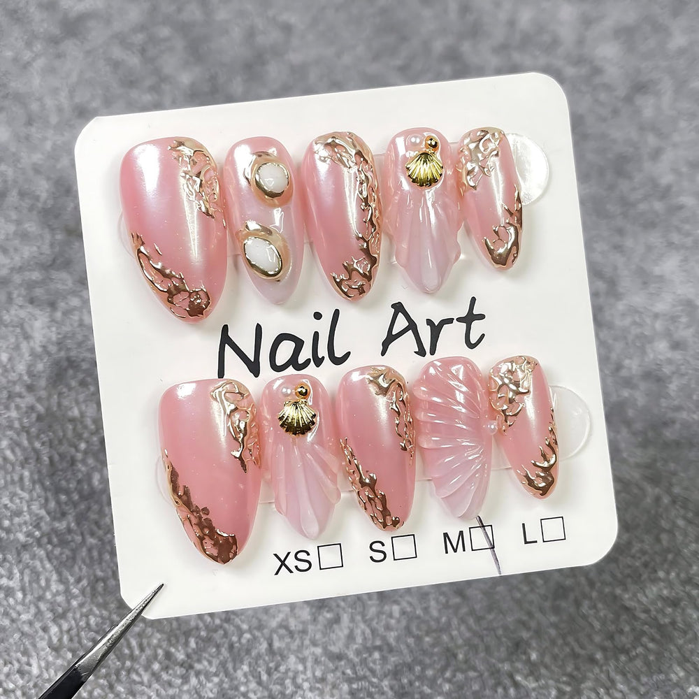 koopnati short almond pink nails for a quick at-home manicure.