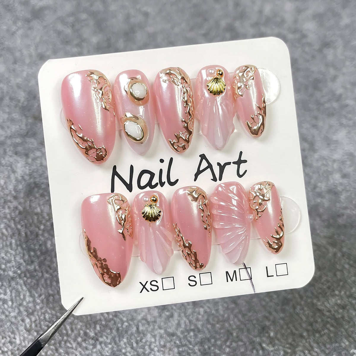 koopnati short almond pink nails for a quick at-home manicure.
