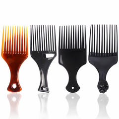 Kootinn amber Afro Lift Pick shown with warm glow for voluminous styling