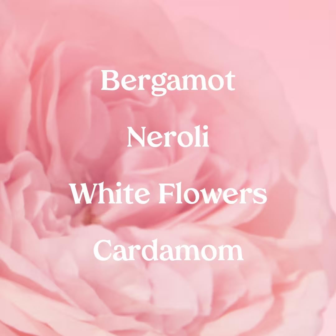 Kopari Marbella Bloom spray in air shows a light floral mist for day wear.