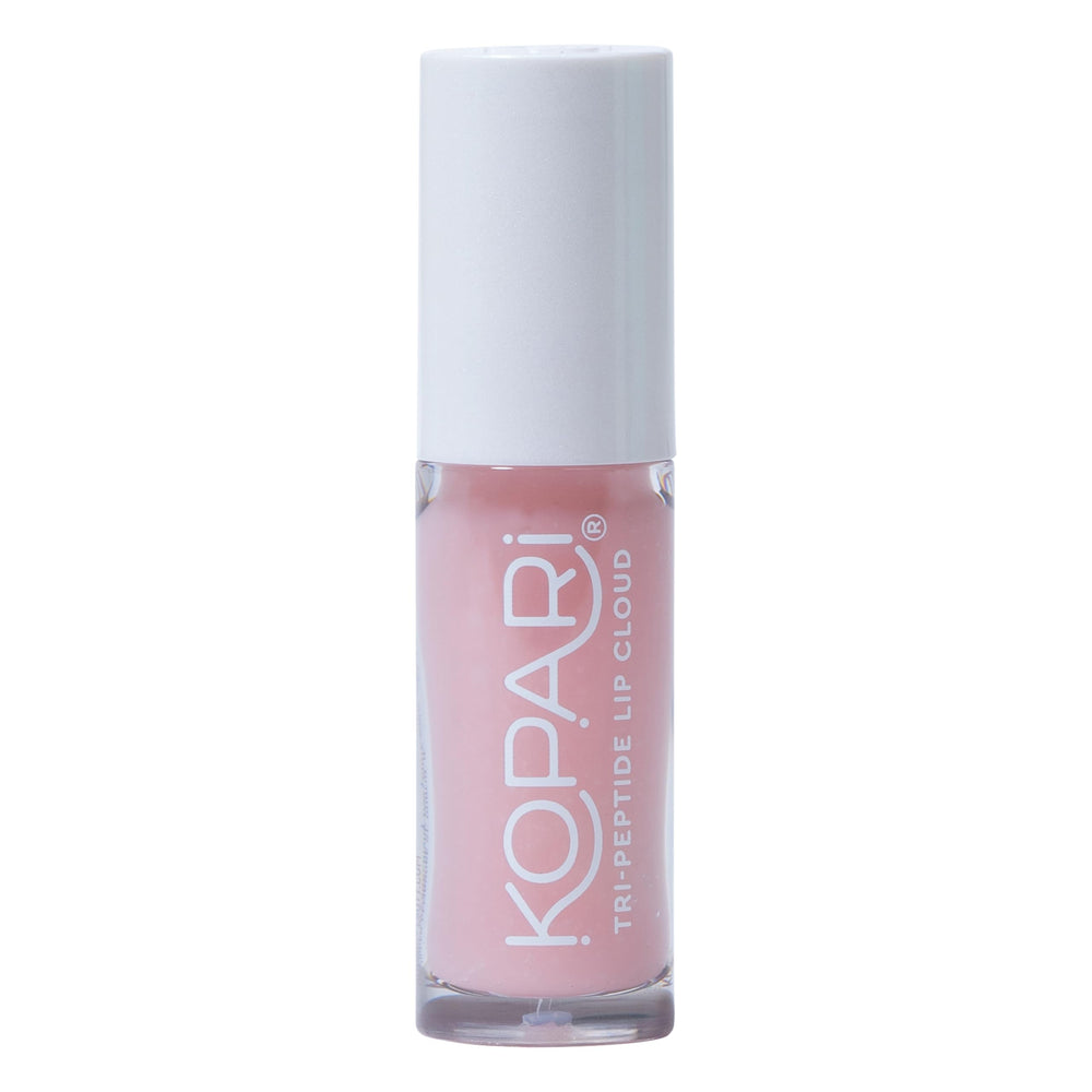 Kopari Tri-Peptide Lip Cloud closeup shows creamy texture delivering lasting hydration.