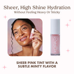 Kopari Tri-Peptide Lip Cloud texture on lips hints at a rich, hydrating feel.
