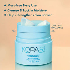 Kopari twist-up grinder in use dispensing fresh cleansing ribbons for easy makeup removal.