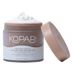 Kopari Ultra Restore Body Butter jar with whipped texture for deep hydration.