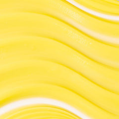 Cream texture close-up of KORA Organics Turmeric Glow moisturizer.