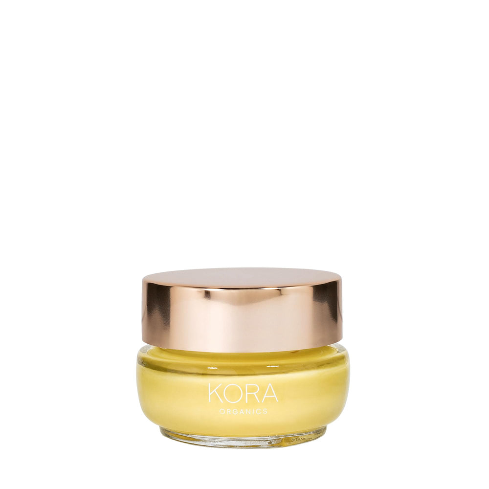 KORA Organics Turmeric Glow travel-size bottle ready for on-the-go hydration.