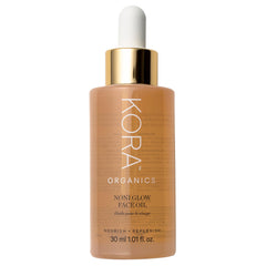 KORA Organics Noni Glow bottle pour for hydrating radiance