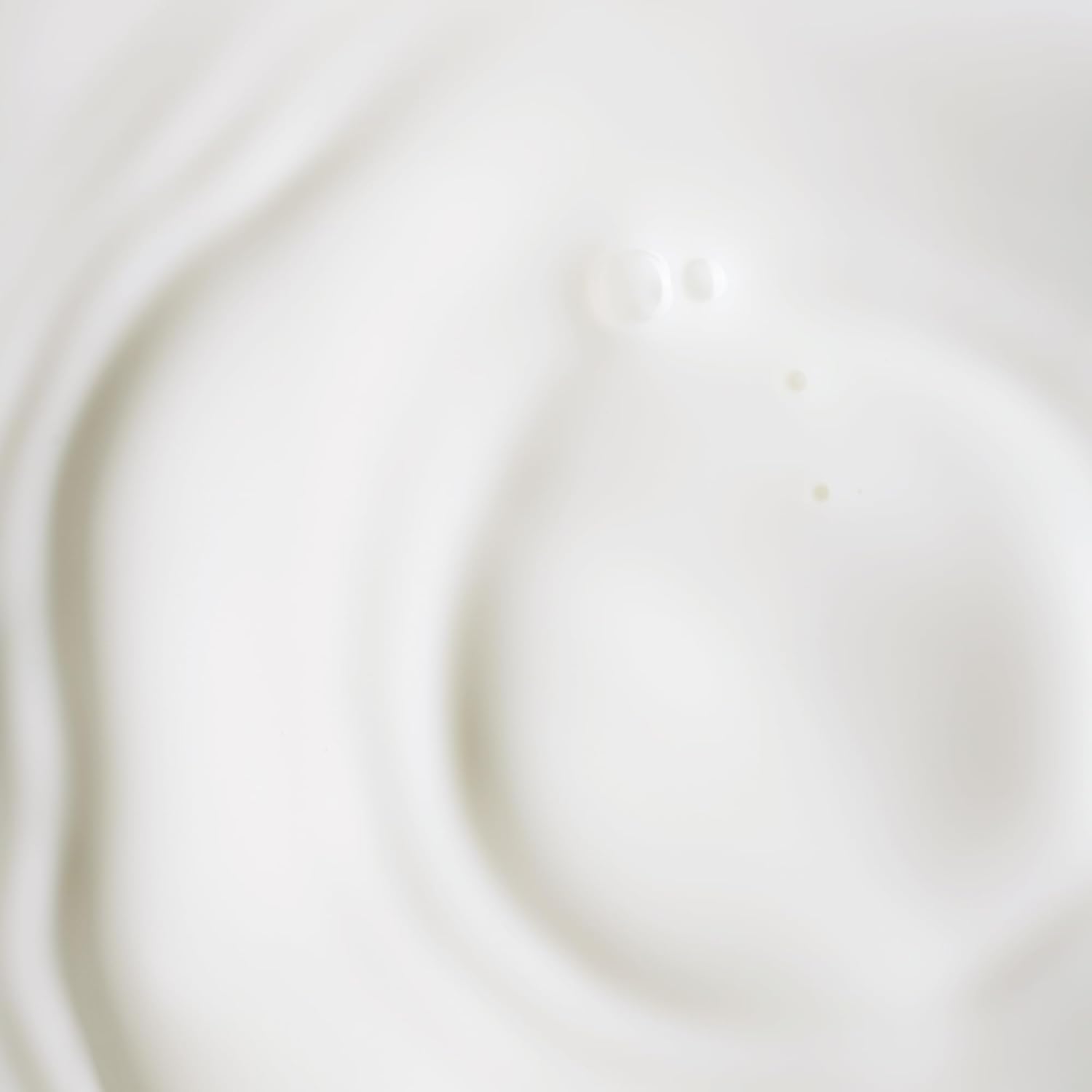 Applying KORA Organics serum for a light, non-greasy finish suitable for day and night.