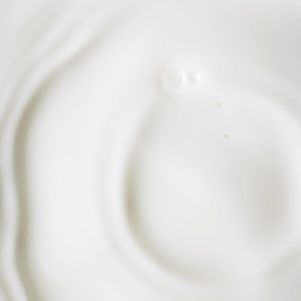 Applying KORA Organics serum for a light, non-greasy finish suitable for day and night.