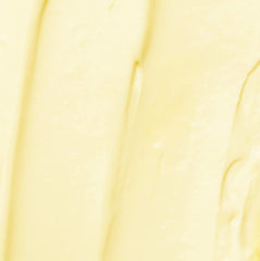 KORA Organics Renewing Hand & Body Lotion texture demonstrates quick absorption for silky skin.