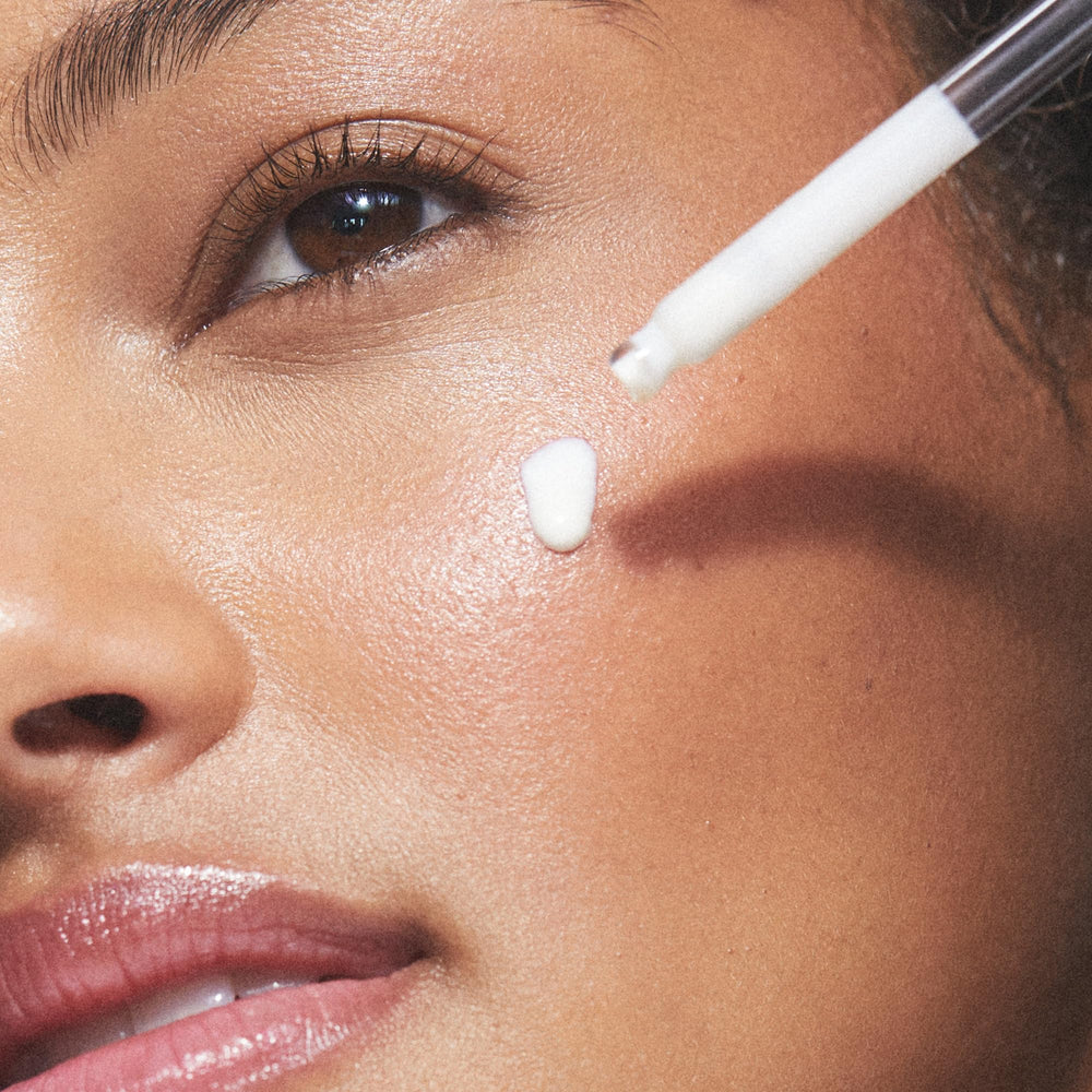 Product in hand illustrating quick absorption and hydration for the skin