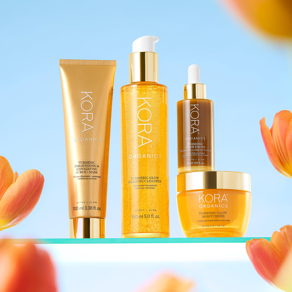 KORA Organics Turmeric Glow Drops ritual setup evokes a spa-like self-care moment.