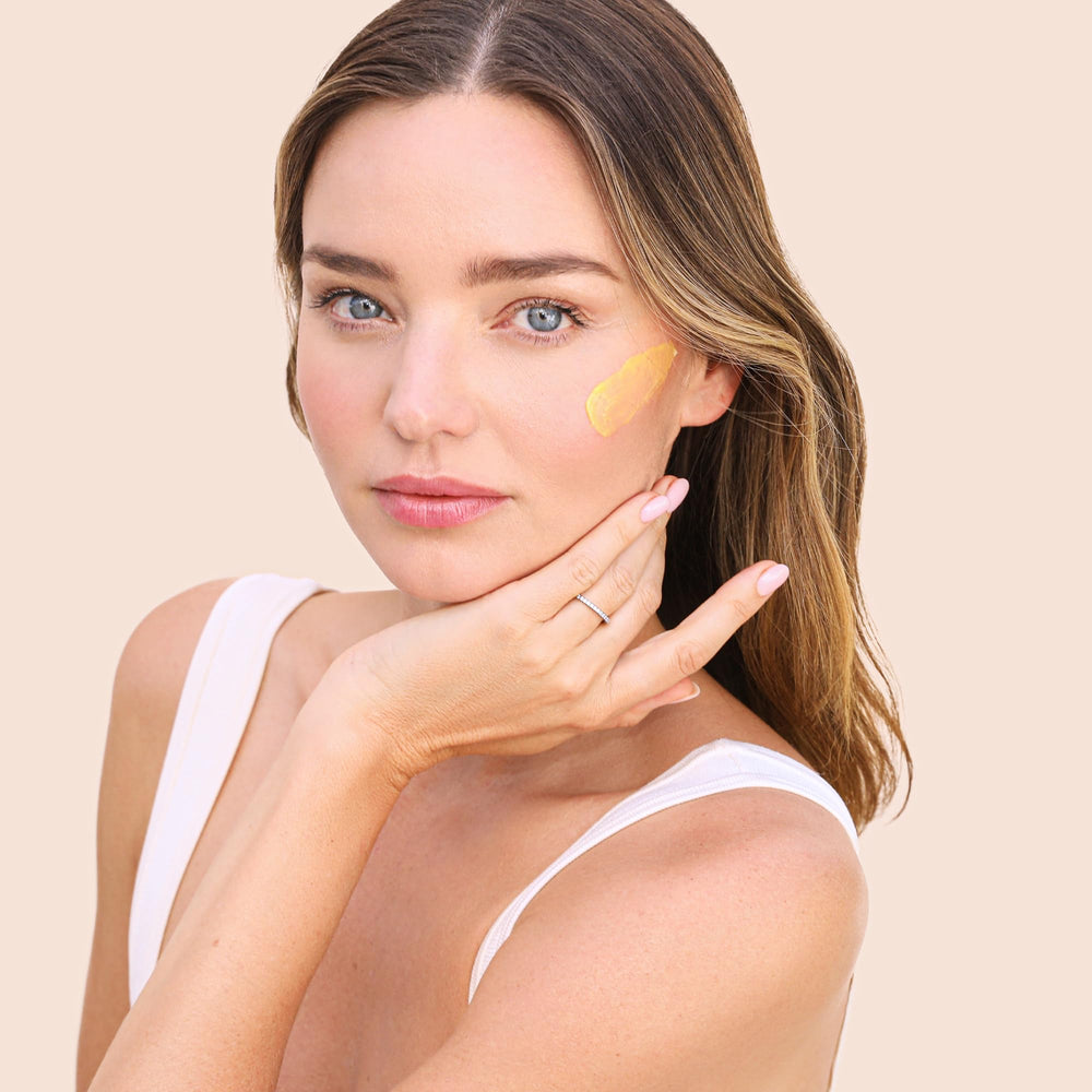 KORA Organics Turmeric Glow desert date and rosehip oils detail, premium moisturizing blend.