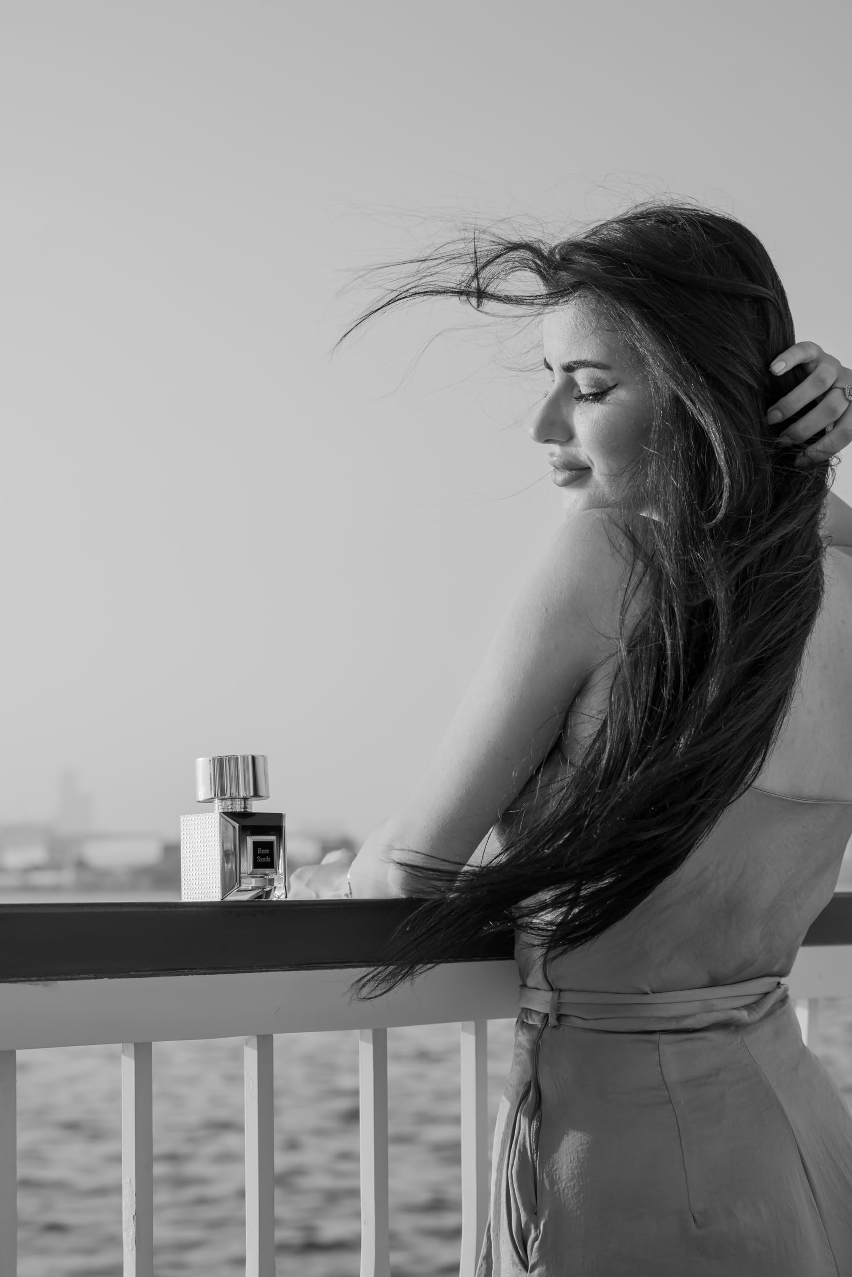 KORBAJ PARFUMS Rose Sands shelf display suggests a luxe addition to fragrance collection