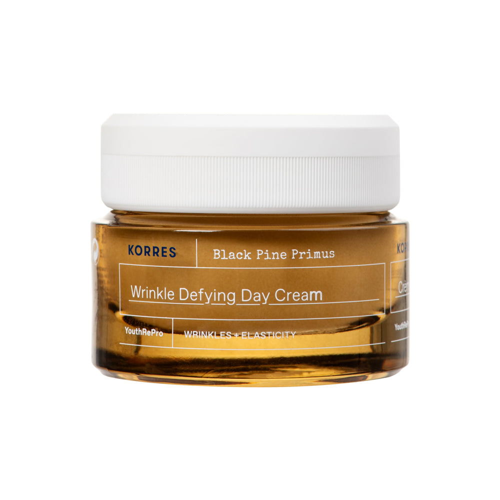 KORRES Black Pine Primus Day Cream texture close-up for hydrated skin.