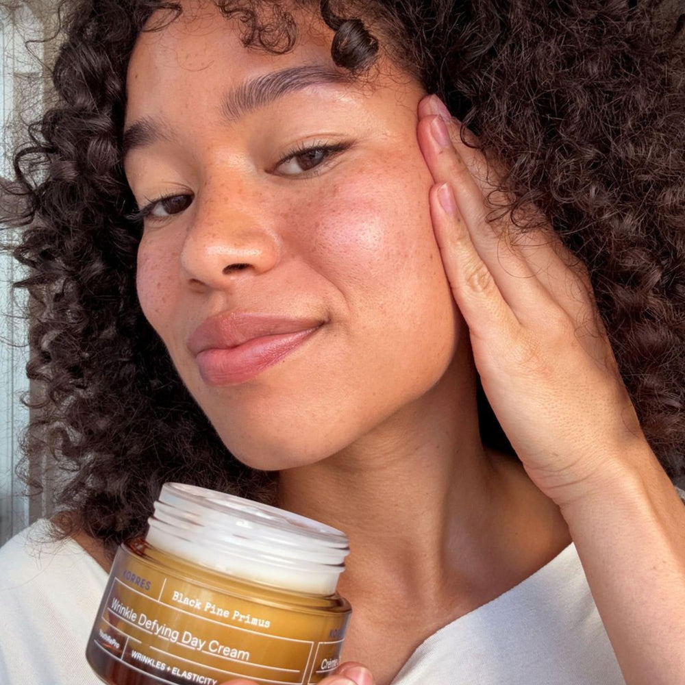 KORRES Black Pine Primus Day Cream YouthRePro complex smooths wrinkles.